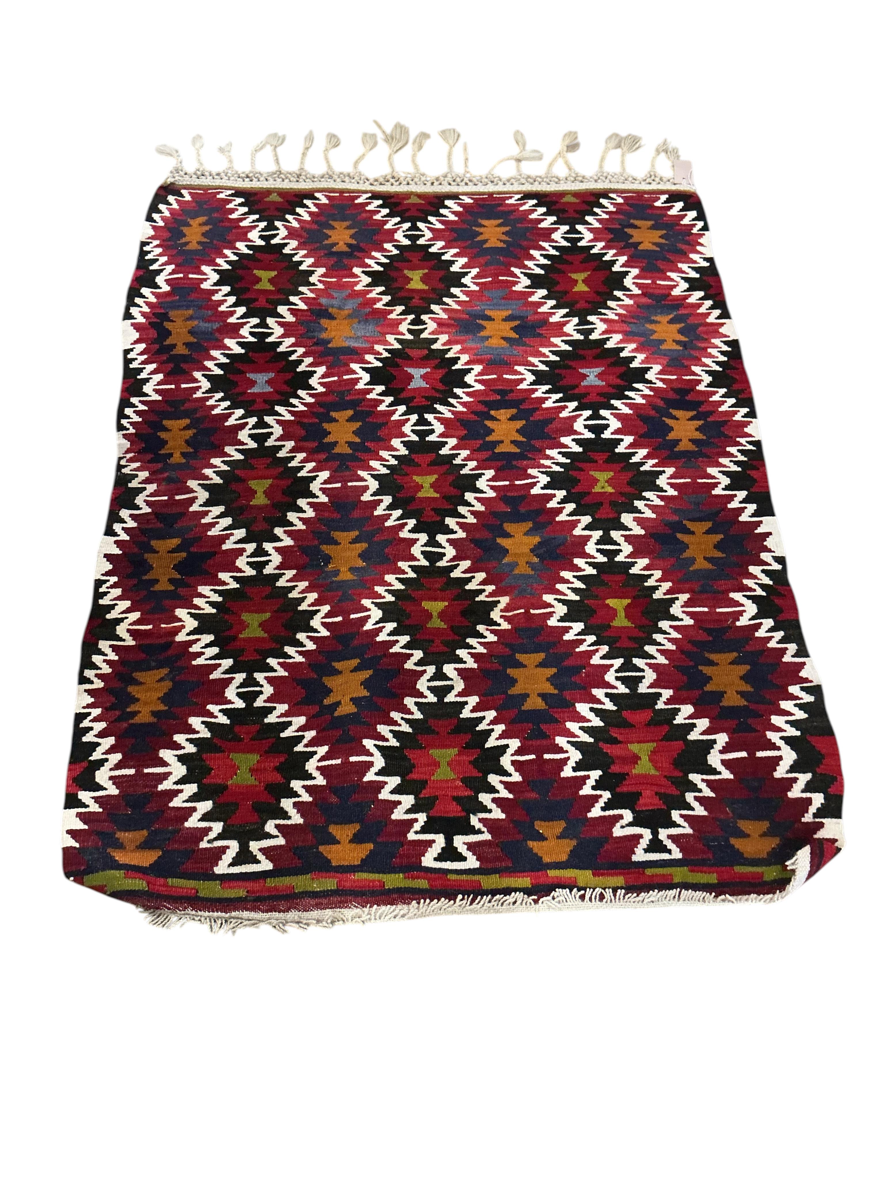 A Kilim polychrome flatweave rug, 130 x 100cm